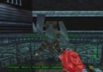 Deal with the Skedar and activate this console to open the doors.